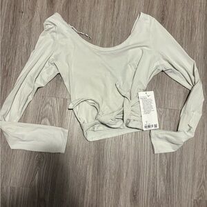 Lululemon it’s a tie long sleeve